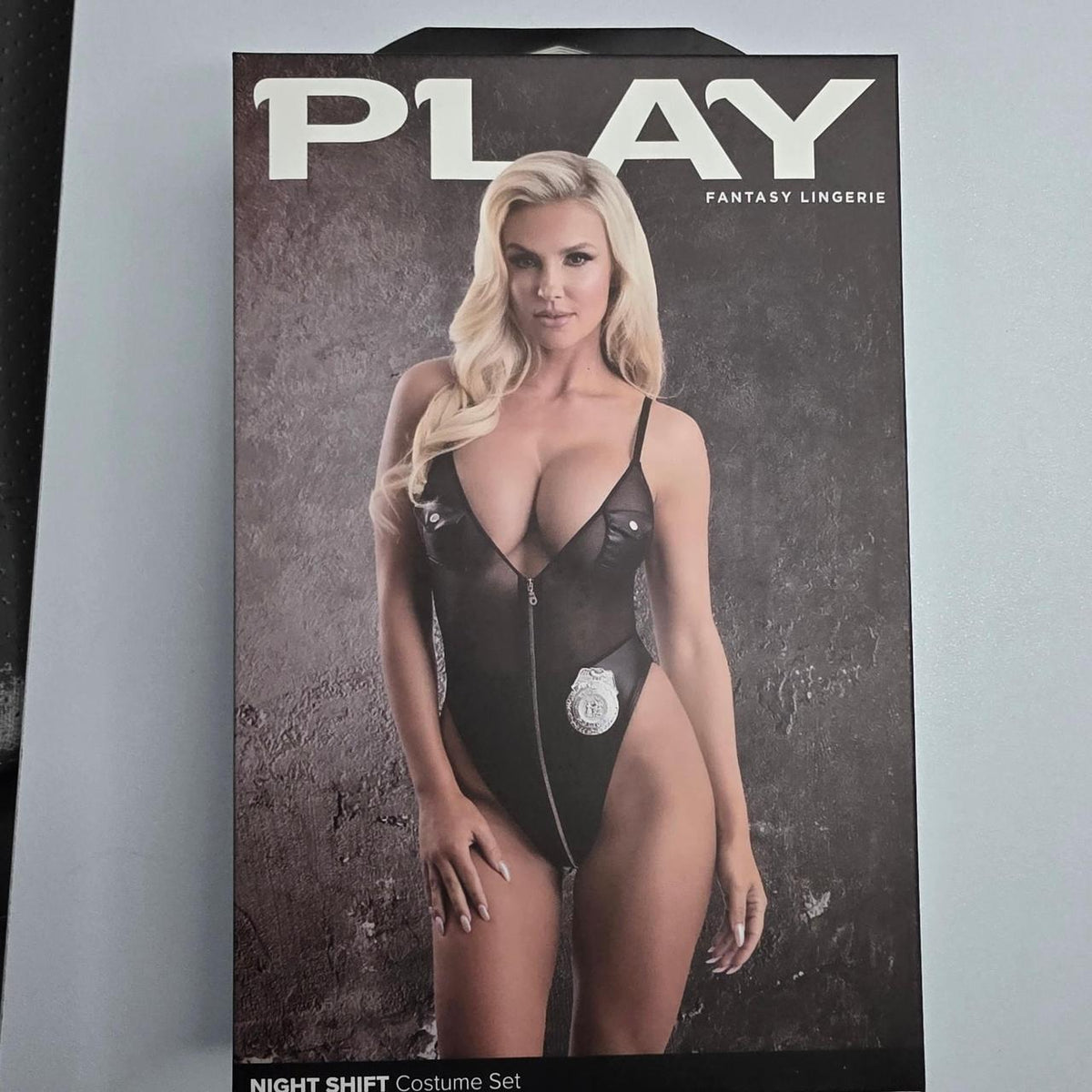 Black mesh bodysuit with faux leather accents and silver badge detail #bodysuit #mesh - Image 2