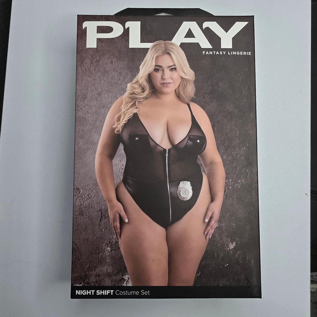 Black mesh bodysuit with faux leather accents and silver badge detail #bodysuit #mesh - Image 2