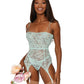 Dreamgirl Lace smocking garter slip and G-string set featuring ruffled elastic trim and a garter-shaped hem